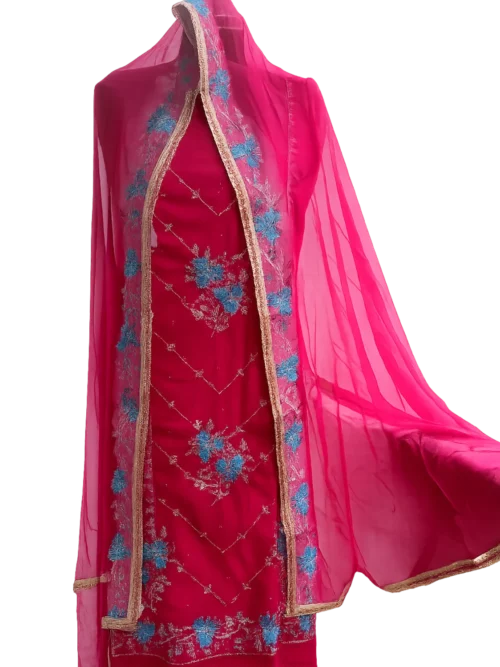 Vibrant pink salwar kameez with gold accents